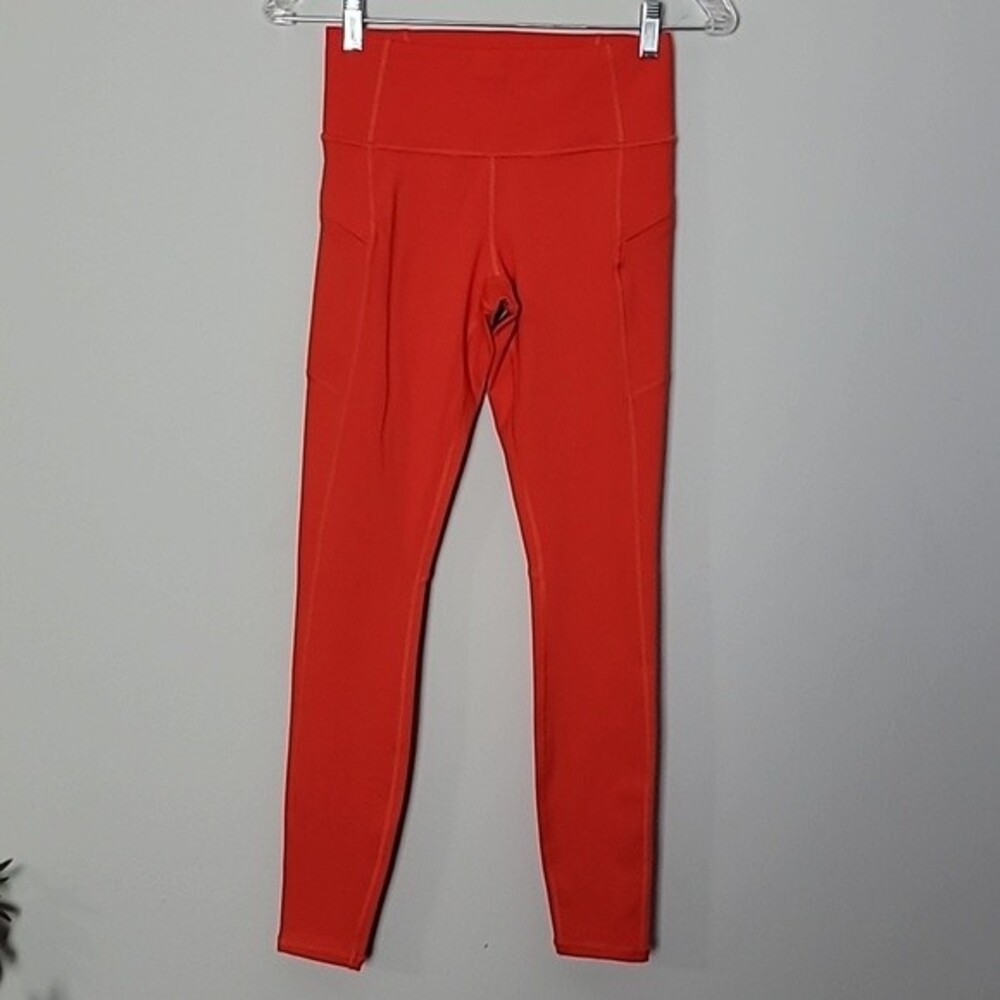 Athleta Contender high rise 7/8 thigh orange Sz XXS